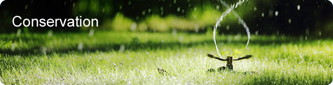 Conservation Banner displaying a water sprinkler on top of grass.